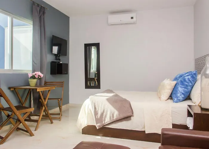 Condohotel 5th Avenue Basic Pensión Playa del Carmen
